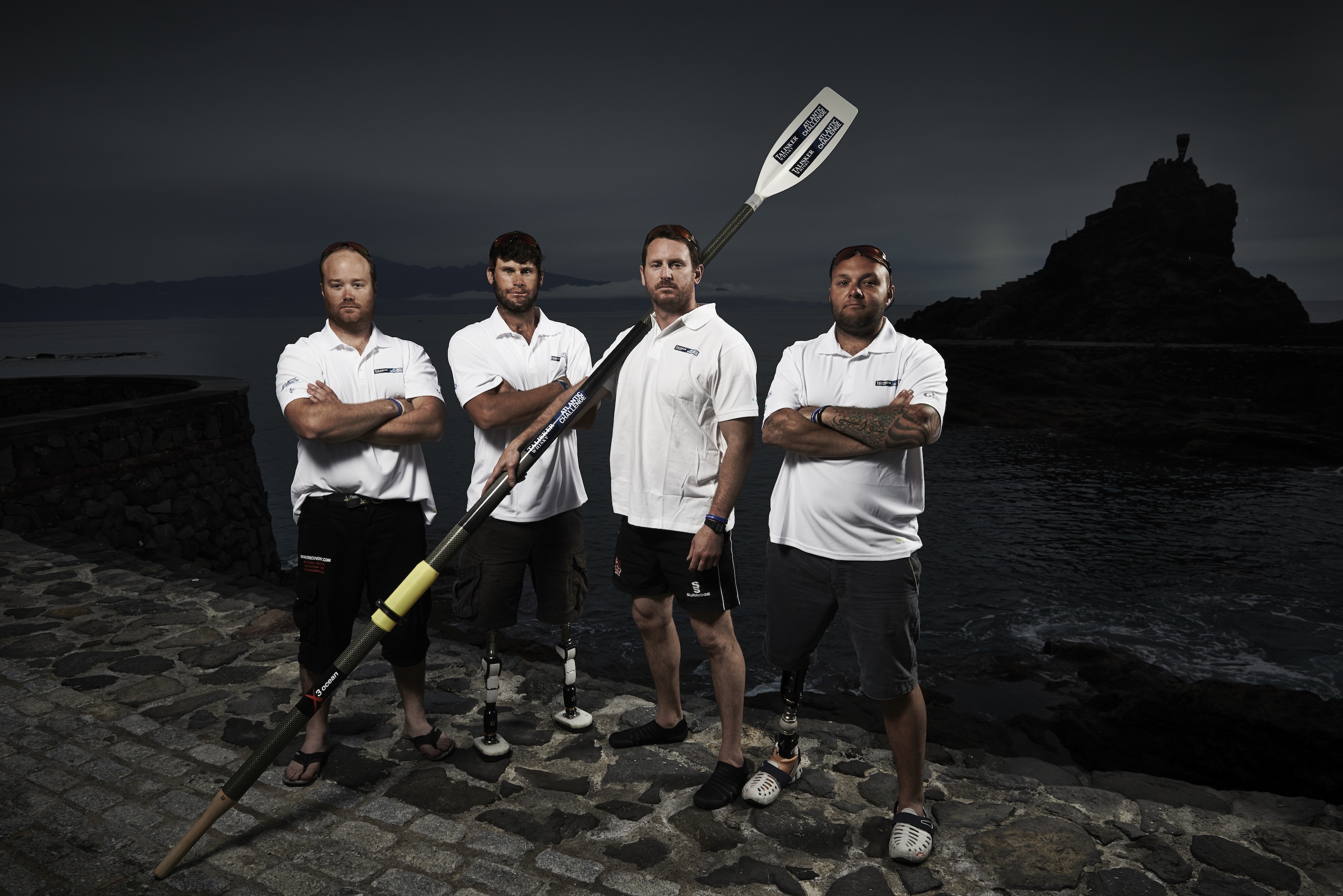 Scott Blaney (right) and the crew of Row2Recoveryy land before the challenge